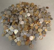 A quantity of world coinage various countries and denominations to include The United States, Greece