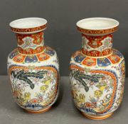 A pair of Imari style vases