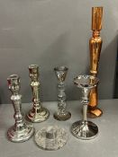 A selection of various size candlesticks