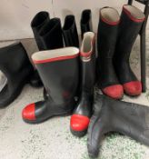 A selection of wellington boots, some with steel toe caps, sizes 12, 42 etc