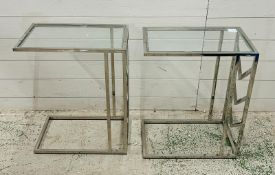 A pair of glass chrome sofa tables