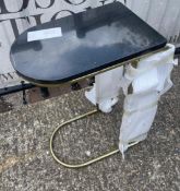 A black marble style topped side table