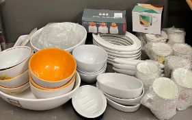 A selection of white china and other kitchen items