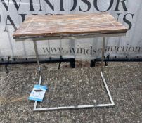 A single side table or sofa table with wooden style top