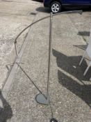 A floor standing chrome light