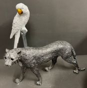 Two contemporary decorative models of a parrot and big cat