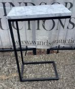 A single side table or sofa table with faux marble top