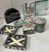 A selection of trinket trays, bookends and photo frames