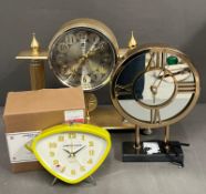 Three contemporary clocks