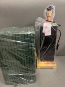 A marble and brass style lamp with green shade