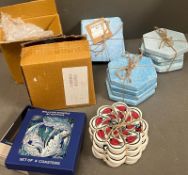 A selection of various matching sets of coasters or drinks mats. Some boxed