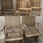 Seven teak folding garden chairs