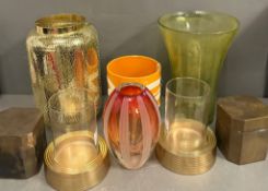 A selection of vases and brass lidded boxes