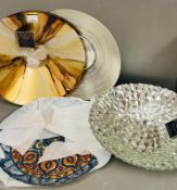Four decorative dishes in various styles