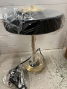 A pair of metal contemporary table lamps