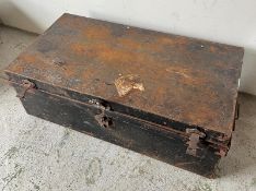 Metal trunk open to a painted inside