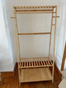 A wooden open shelving unit/wardrobe. (H170cm W83cm D45cm)