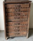 A wooden fruit tray storage rack with multiple sliding trays. (H118cm W74cm D50cm)