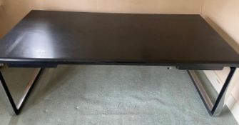 Tecno modern black rectangular desk/table with sled-style metal supports. (H70cm W200cm D100cm)