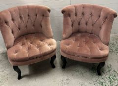 A pair of low button back pink chairs by Dunelm