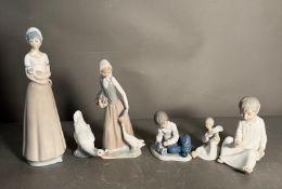 A selection of six porcelain figures, various makers including Nao and themes.