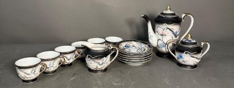A Japanese marriage Dragon ware tea set comprising of cups, saucers and teapot