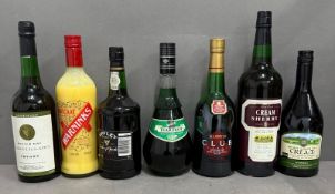 A selection of spirits to include cream sherry, Bols crème de menthe and Advocat.