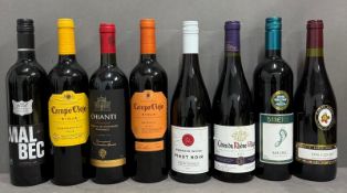 A selection of red wines to include a Fleurie, a Pinot noir and a chianti .