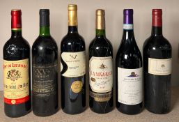 Six bottles of red wine to include a Rioja Gran Reserva and a Santa Vitoria Gran Reserva 2014