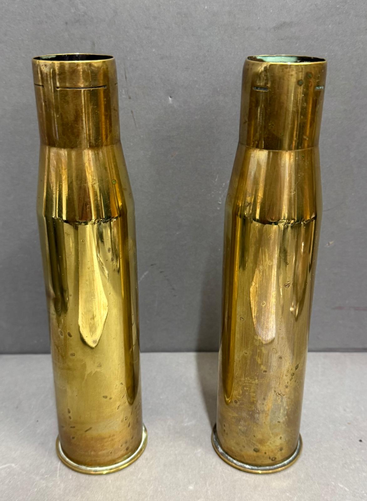 Fixed Shell Case A pair of brass shell cases