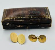 A pair of 9ct gold oval cufflinks, approximate weight 5.8g