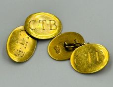 A pair of 18ct golf oval cufflinks with the initials CTB and an approximate weight of 13.9g