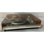 A Goldring G 102 Turntable, lid has a little damage.