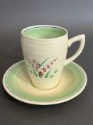 Clarice Cliff Bizarre coffee cup and saucer, Art Deco floral design