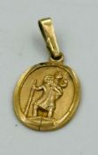 A 9ct gold St Christopher medallion with an approximate weight of 1.1g