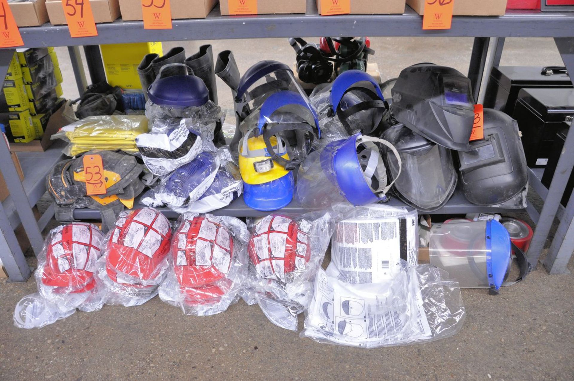 Lot - Personal Protection Equipment Under (1) Bench, Including: Hard Hats, Safety Shields, Welding