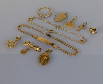 An assortment of Italian yellow gold jewellery to include two bracelets, two pendants and a ribbon 