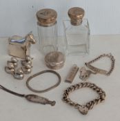 A selection of silver jewellery to include a flat curb-link bracelet with heart locket, name bracele