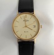 A gents gold-cased Rotary Elite wristwatch with champagne dial, baton markers, seconds sweeping hand