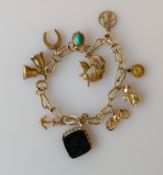 A 9ct yellow gold charm bracelet, all hallmarked, 22g (without bloodstone)