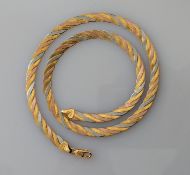 An Italian 750 tri-gold woven necklace with lobster clasp by Tecnigold, 43 cm, hallmarked, 17.7g