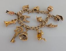 A 9ct gold charm bracelet with heart-lock clasp, all hallmarked, 35.6g