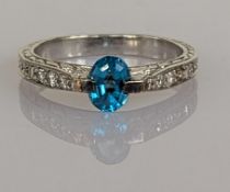 A gem-set white gold ring with diamond decoration, size P, stamped 18k, 4.8g