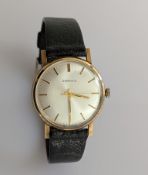 A vinatge Garrard of London gent's manual wristwatch with silvered dial, baton markers