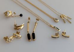 A matching sapphire and diamond pendant chain and earrings; two other pendant chains