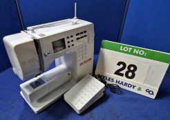 A BERNINA B335 Electric Sewing Machine with Treadle Operation