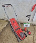 An EINHELL 18V Battery Powered Lawn Mower and Battery Powered Strimmer with One Battery and Charger