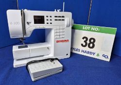 A BERNINA B335 Electric Sewing Machine with Treadle Operation
