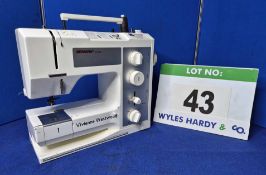 A BERNINA 1008 Classic Electric Sewing Machine with Treadle Operation