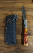 Custom Damascus Steel Folding Knife - Fire Swirl Resin Handle & Leather Sheath